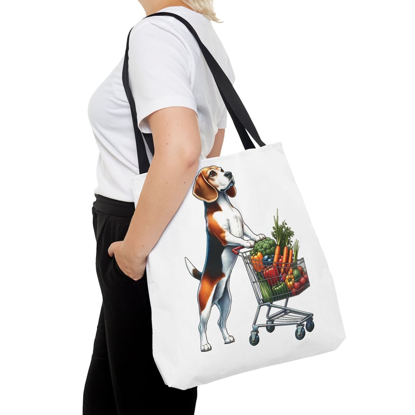 Woman displays vibrant beagle tote with shopping cart full of fruits and vegetables.