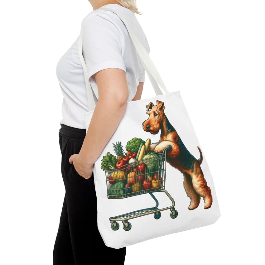 Blonde person with dog grocery shopping tote, wearing casual outfit with white t-shirt.