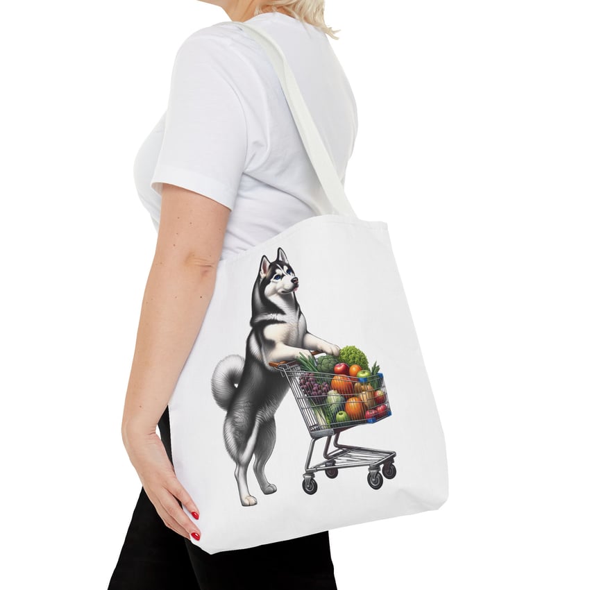 Husky tote bag with whimsical art of dog pushing a colorful grocery cart.