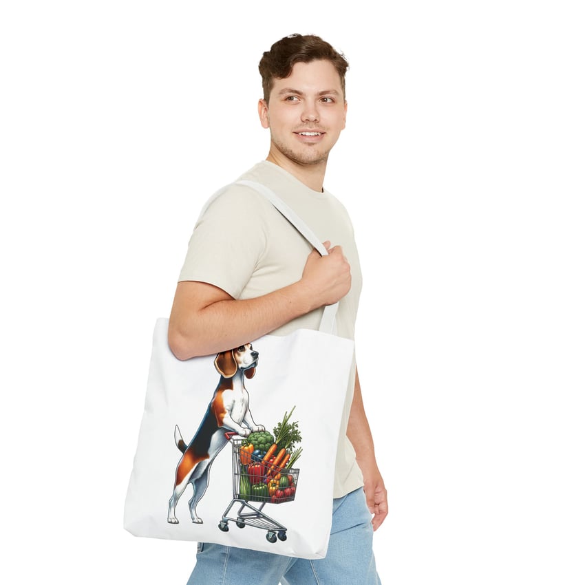Young man smiling with a beagle tote bag, wearing casual attire.