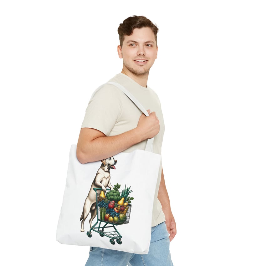 Young man with stylish dog-themed tote bag and casual outfit.