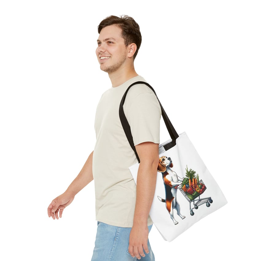 Young man with playful beagle tote bag, stylishly dressed against a white background.